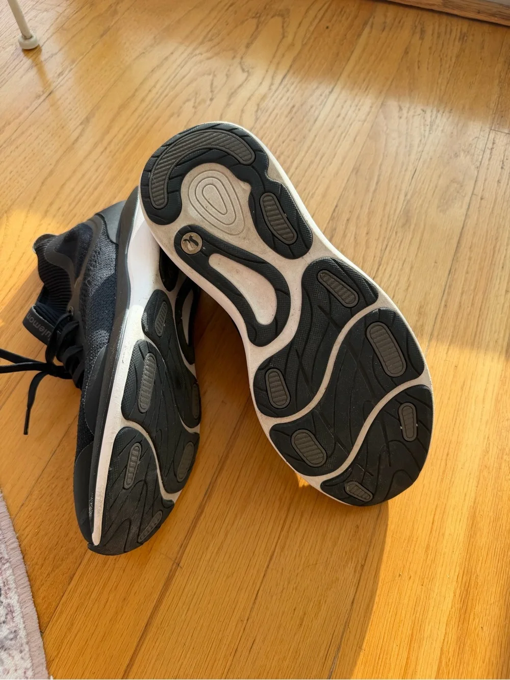 lululemon athletica women’s Black Knit Slip-On Sneakers with White Soles